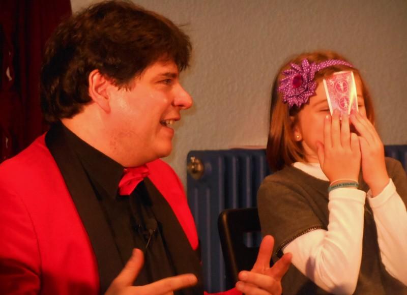 Magician Olivier OK MAGICS interacting with child in Tajonar Spain Halloween Tour Fall 2014